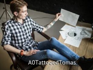 A0TattooedTomas